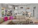 Spacious living area with comfortable sectional sofa and open floor plan at 2305 Little Country Rd, Parrish, FL 34219