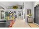 Open concept living space with eclectic decor and natural light at 2305 Little Country Rd, Parrish, FL 34219