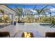 Enjoy a fire pit and a view of your private pool at 2305 Little Country Rd, Parrish, FL 34219