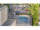Enclosed pool and patio area with firepit at 2305 Little Country Rd, Parrish, FL 34219