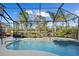 Large screened pool with spa and a beautiful view at 2305 Little Country Rd, Parrish, FL 34219