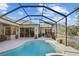 Luxury pool and spa with screened enclosure and gorgeous view at 2305 Little Country Rd, Parrish, FL 34219