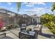 Expansive pool patio with seating area and partially covered patio area at 2305 Little Country Rd, Parrish, FL 34219