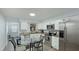 Kitchen with stainless steel appliances and granite countertops at 2825 Forest Ln, Sarasota, FL 34231