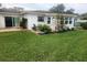 Spacious backyard with lush lawn and patio area at 2905 51St W Ave, Bradenton, FL 34205