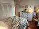 Bedroom with double doors and a dresser at 2905 51St W Ave, Bradenton, FL 34205