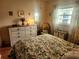 Cozy bedroom with leafy bedding and dresser at 2905 51St W Ave, Bradenton, FL 34205