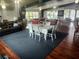 Spacious community room with seating, tables, and game tables at 2905 51St W Ave, Bradenton, FL 34205