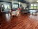 Spacious community room with tables and game area at 2905 51St W Ave, Bradenton, FL 34205