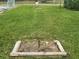 Horseshoe pit with wooden frame and grassy area at 2905 51St W Ave, Bradenton, FL 34205