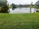 Serene lake view with lush green surroundings at 2905 51St W Ave, Bradenton, FL 34205