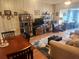 Spacious living room with hardwood floors, dining area, and built-in shelving at 2905 51St W Ave, Bradenton, FL 34205