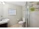 Clean bathroom with shower, toilet, and vanity at 2912 Bayshore Gardens Pkwy, Bradenton, FL 34207