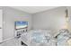 Bright bedroom with a comfortable bed and coastal bedding at 3500 Beneva Rd # 303, Sarasota, FL 34232