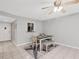 Bright dining area with a table, four chairs, and bench seating at 3500 Beneva Rd # 303, Sarasota, FL 34232