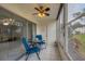 Relaxing screened porch with outdoor seating and view at 3500 Beneva Rd # 303, Sarasota, FL 34232