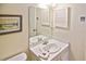 Clean bathroom boasts a single sink vanity and shower/tub combo at 365 Three Lakes Ln # G, Venice, FL 34285