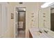 Clean bathroom with double vanity and access to a shower at 365 Three Lakes Ln # G, Venice, FL 34285
