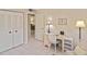 Bright home office features built-in desk and ample storage at 365 Three Lakes Ln # G, Venice, FL 34285