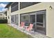 Private patio with seating area, offering a peaceful outdoor retreat at 365 Three Lakes Ln # G, Venice, FL 34285