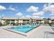 Relaxing community pool with plenty of lounge chairs at 365 Three Lakes Ln # G, Venice, FL 34285