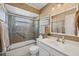 Updated bathroom with a tub shower combo and modern vanity at 4045 Oakhurst Dr # 3125, Sarasota, FL 34233