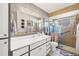 Clean bathroom with a large shower and updated vanity at 4045 Oakhurst Dr # 3125, Sarasota, FL 34233