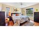 Spacious main bedroom with a king-size bed and plenty of natural light at 4045 Oakhurst Dr # 3125, Sarasota, FL 34233