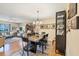 Open dining area with a view of the living room at 4045 Oakhurst Dr # 3125, Sarasota, FL 34233