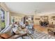 Open concept living area with dining and kitchen views at 4045 Oakhurst Dr # 3125, Sarasota, FL 34233
