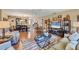 Open concept living and dining area with hardwood floors at 4045 Oakhurst Dr # 3125, Sarasota, FL 34233