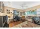 Home office features built-in shelving and comfortable seating at 4045 Oakhurst Dr # 3125, Sarasota, FL 34233
