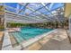 Refreshing community pool under a covered patio at 4045 Oakhurst Dr # 3125, Sarasota, FL 34233