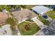 Aerial view of single-Gathering home with pool and landscaped yard at 407 68Th Avenue W Dr, Bradenton, FL 34207