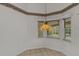 Breakfast nook with stained glass light fixture and view of pool at 407 68Th Avenue W Dr, Bradenton, FL 34207