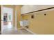 Laundry area with a sink, cabinets, and access to Gathering room at 407 68Th Avenue W Dr, Bradenton, FL 34207