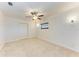 Simple bedroom with ceiling fan and carpet at 4119 52Nd W St, Bradenton, FL 34209