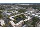 Aerial view of condo building by lake at 425 30Th W Ave # C206, Bradenton, FL 34205