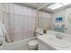 Bathroom with tub shower combination and vanity at 425 30Th W Ave # C206, Bradenton, FL 34205