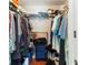 Well-organized closet with ample shelving and hanging space at 425 30Th W Ave # C206, Bradenton, FL 34205