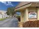 Gated entrance to Wood Park Villas De Soto Square community at 425 30Th W Ave # C206, Bradenton, FL 34205