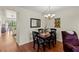 Dining room with dark wood table and chairs at 425 30Th W Ave # C206, Bradenton, FL 34205