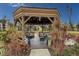 Relaxing gazebo with lake views and comfortable seating at 425 30Th W Ave # C206, Bradenton, FL 34205