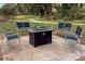 Outdoor patio furniture with fire pit, perfect for entertaining at 425 30Th W Ave # C206, Bradenton, FL 34205