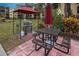 Picnic table and grill under a covered patio at 425 30Th W Ave # C206, Bradenton, FL 34205