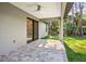Covered patio with paver stones and a ceiling fan at 4497 N Salford Blvd, North Port, FL 34286