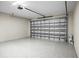 Spacious garage with epoxy flooring and automatic garage door opener at 4497 N Salford Blvd, North Port, FL 34286