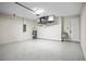 Finished garage with epoxy flooring and utility sink at 4497 N Salford Blvd, North Port, FL 34286
