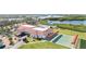 Community clubhouse, pool, and shuffleboard courts at 4534 Fern Dr, Bradenton, FL 34208