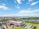 Community clubhouse, pool, and shuffleboard courts at 4534 Fern Dr, Bradenton, FL 34208